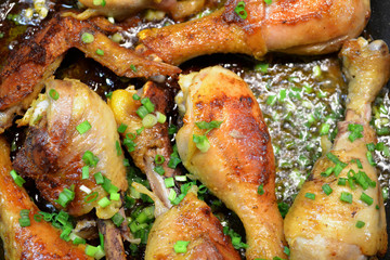 Healthy diet food: roasted chicken legs closeup.