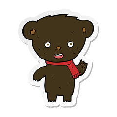 sticker of a cartoon cute black bear