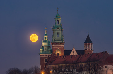 February Full Moon (Snow Moon, Supermoon) over Wawel castle and cathedral, Krakow, Poland