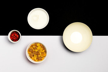 Group ceramic bowls with healthy cereal breakfast