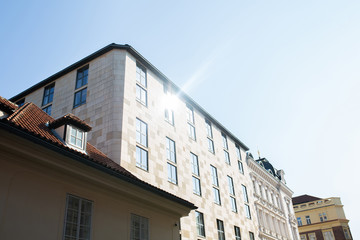 Fototapeta na wymiar Modern building with sun reflections in Prague