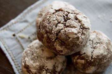 Fototapeta na wymiar Homemade brownie cookies in powder sugar