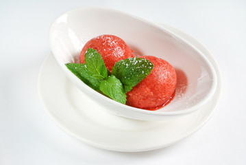 sorbet ice cream with mint in bowl