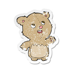 retro distressed sticker of a cartoon happy little teddy bear