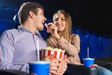 Couple having a date at the movie theatre