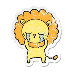 distressed sticker of a crying cartoon lion