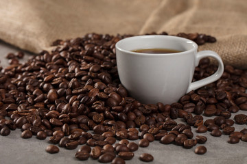 Coffee beans and cup