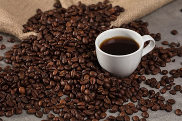 Coffee beans and cup