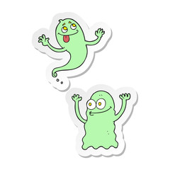 sticker of a cartoon ghosts