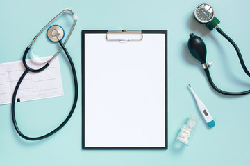 Blue medical background with clipboard and stethoscope