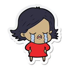 sticker of a cartoon girl crying
