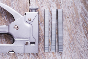 stapler and its staples on the table