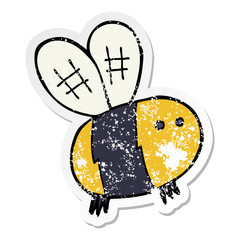 distressed sticker of a cartoon bee