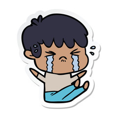sticker of a cartoon boy crying
