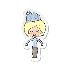 retro distressed sticker of a cartoon woman wearing winter hat