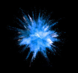Explosion of blue powder on black background