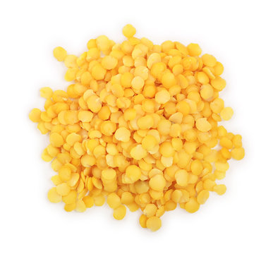 Pile of yellow lentil isolated on white background. Top view