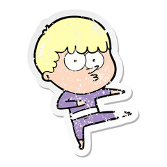 distressed sticker of a cartoon curious boy dancing