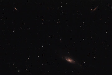 The intermediate spiral galaxy Messier 106 in the constellation Canes Venatici photographed from Wachenheim in Germany.