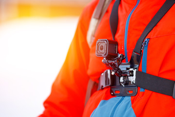 Close-up mount for action camera on straps chest, active skiing or snowboarding