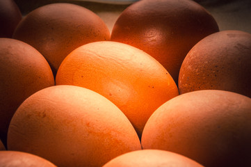 eggs colored with natural dye on brown dish