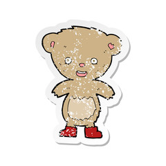 retro distressed sticker of a cartoon teddy bear