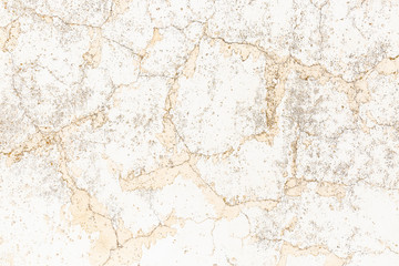 white stucco wall background with small cracks in the paint