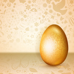 Big golden Easter egg standing on background of flowers, cakes, hare, chicken and other holiday symbols
