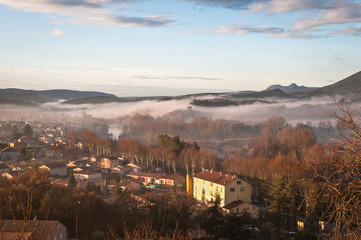 View of the village Saint Bauzille de Putois in fog, Herault, France