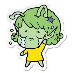 sticker of a cartoon crying alien girl