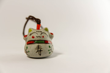 Maneki Neko - Japanese welcoming cat - with clipping path