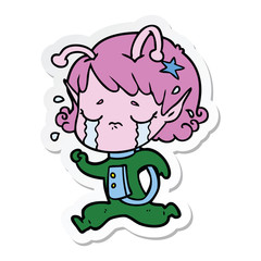 sticker of a cartoon crying alien girl