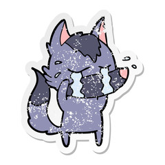 distressed sticker of a cartoon crying wolf