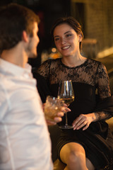 Young couple enjoying romantic date at the bar