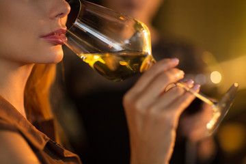 Beautiful women enjoying drinks at the bar