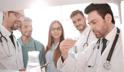 Fototapeta premium Cheerful young researchers are working in lab