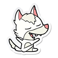 sticker of a cartoon wolf laughing