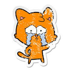 distressed sticker of a cartoon crying cat