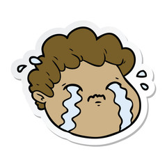 sticker of a cartoon crying boy
