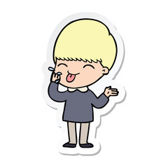 sticker of a cartoon boy sticking out tongue