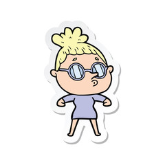 sticker of a cartoon woman wearing glasses