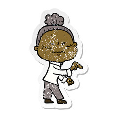 distressed sticker of a cartoon annoyed old lady