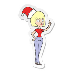 sticker of a cartoon woman wearing christmas hat