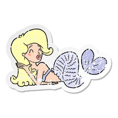 Obraz premium distressed sticker of a cartoon mermaid