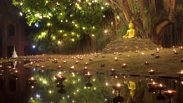 Magha puja day, Monks light the candle for buddha, Chiangmai,Thailand