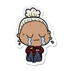 sticker of a cartoon crying old lady