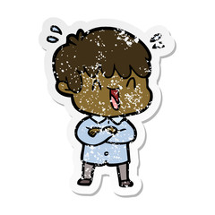 distressed sticker of a cartoon laughing boy
