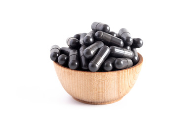 Bowl Full of Activated Charcoal Capsules
