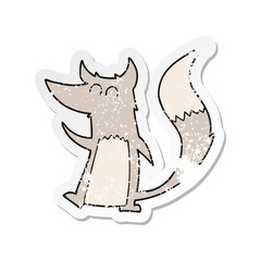 retro distressed sticker of a cartoon little wolf
