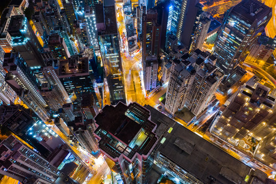 Aerial view of Hong Kong city at night © leungchopan